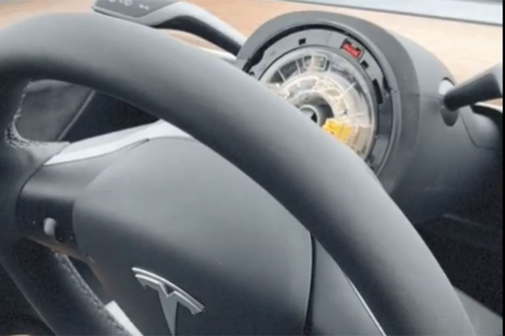 Tesla with broken steering wheel