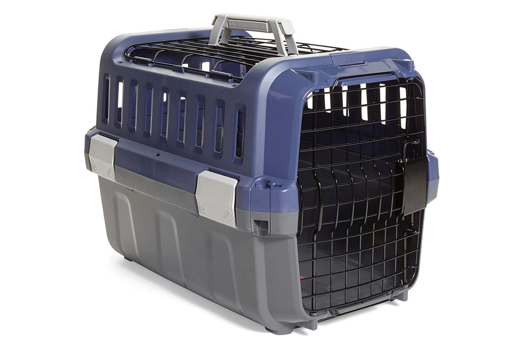 A plastic dog crate