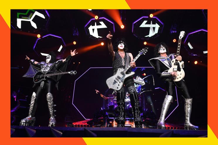 KISS rocks out onstage in their makeup.