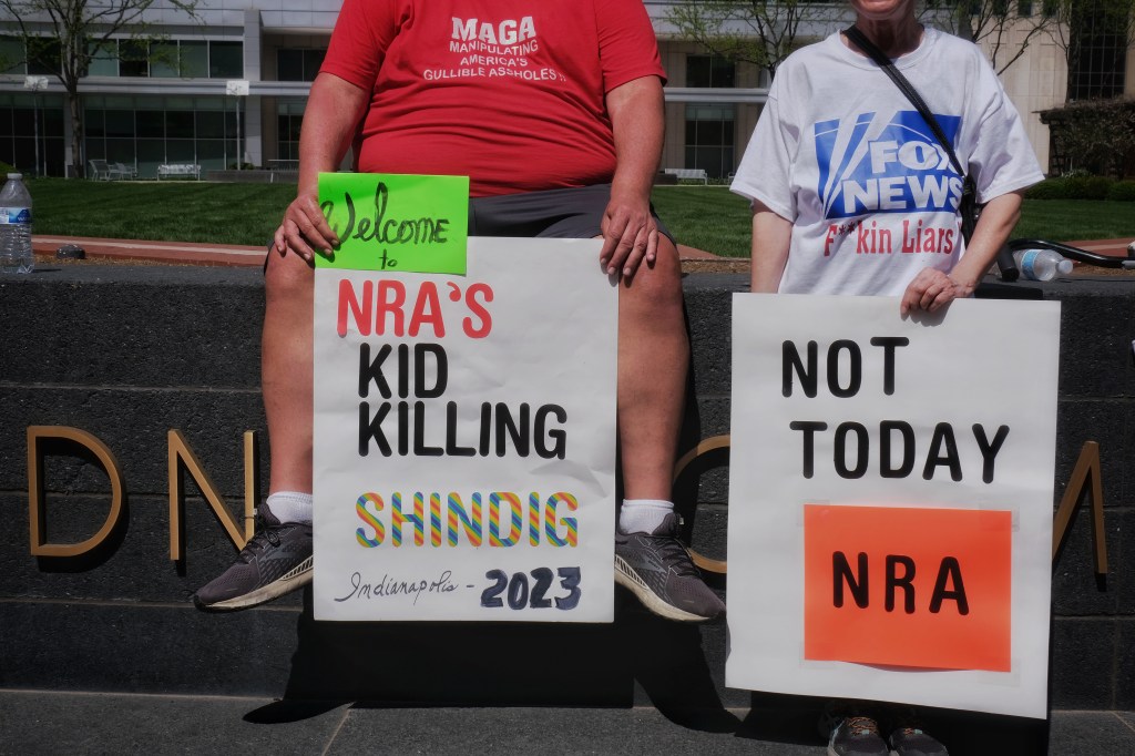 Protesters at the NRA convention to call for gun control. 