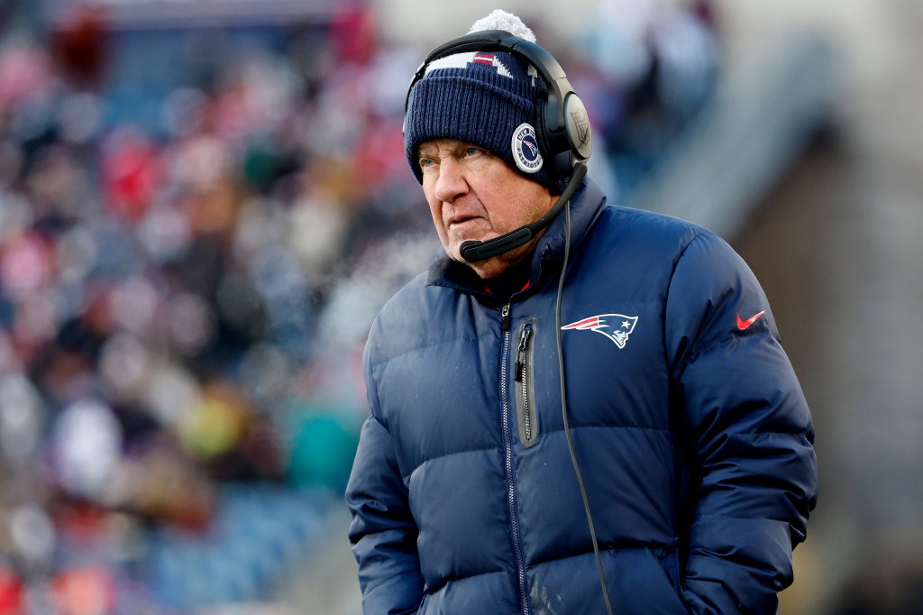 Head coach Bill Belichick of the New England Patriots looks on during the second half against the Cincinnati Bengals at Gillette Stadium on December 24, 2022 in Foxborough, Massachusetts. (Photo by Winslow Townson/Getty Images)