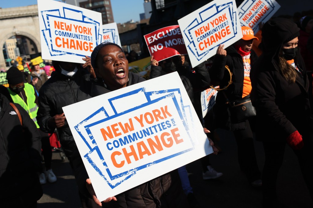 people protesting about housing