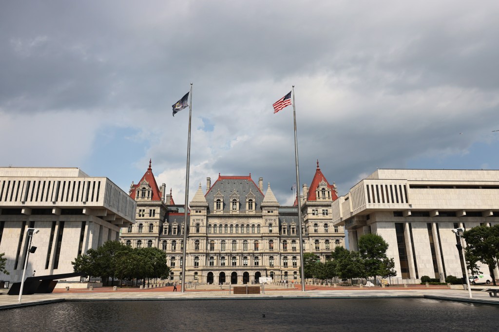 Exterior shot of the New York State Capitol as seen from Empire State Plaza in the foreground