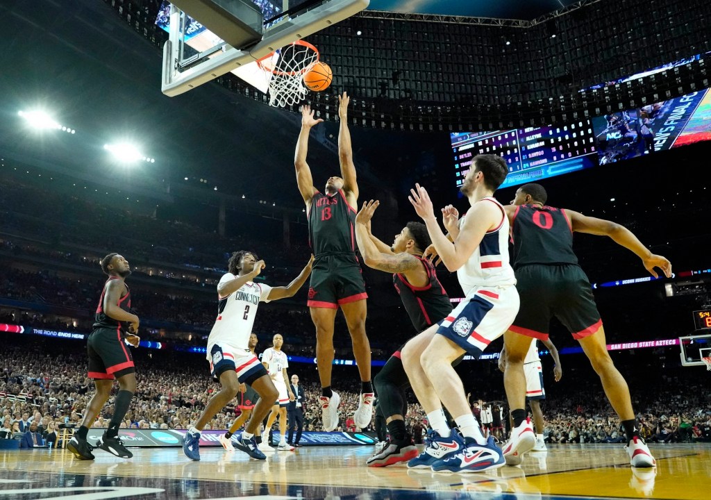 San Diego State Aztecs forward Jaedon LeDee (13) grabs a rebound against the Connecticut Huskies