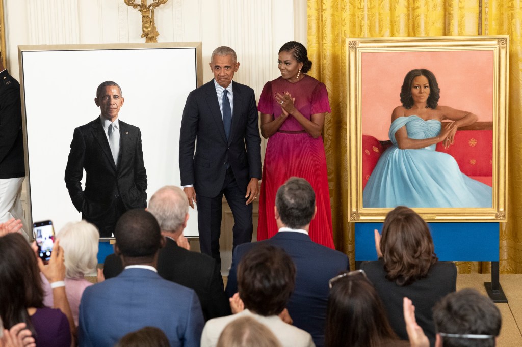 Former President Barack Obama and first lady Michelle Obama at their White House portrait unveiling