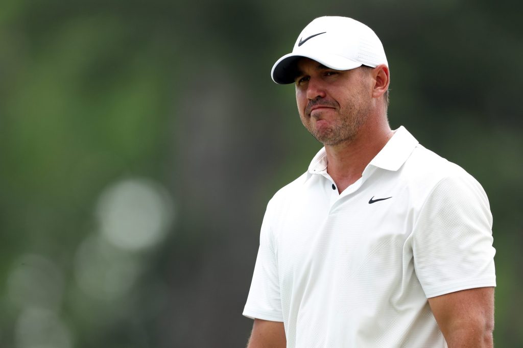 Brooks Koepka of the United States reacts on the 18th green during the second round of the 2023 Masters Tournament at Augusta National Golf Club on April 07, 2023 in Augusta, Georgia.