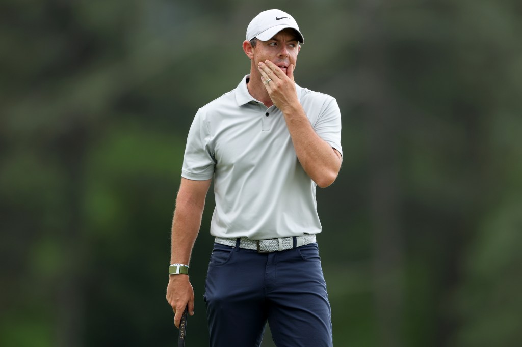 Rory McIlroy of Northern Ireland reacts to a putt on the 18th green during the second round of the 2023 Masters Tournament.