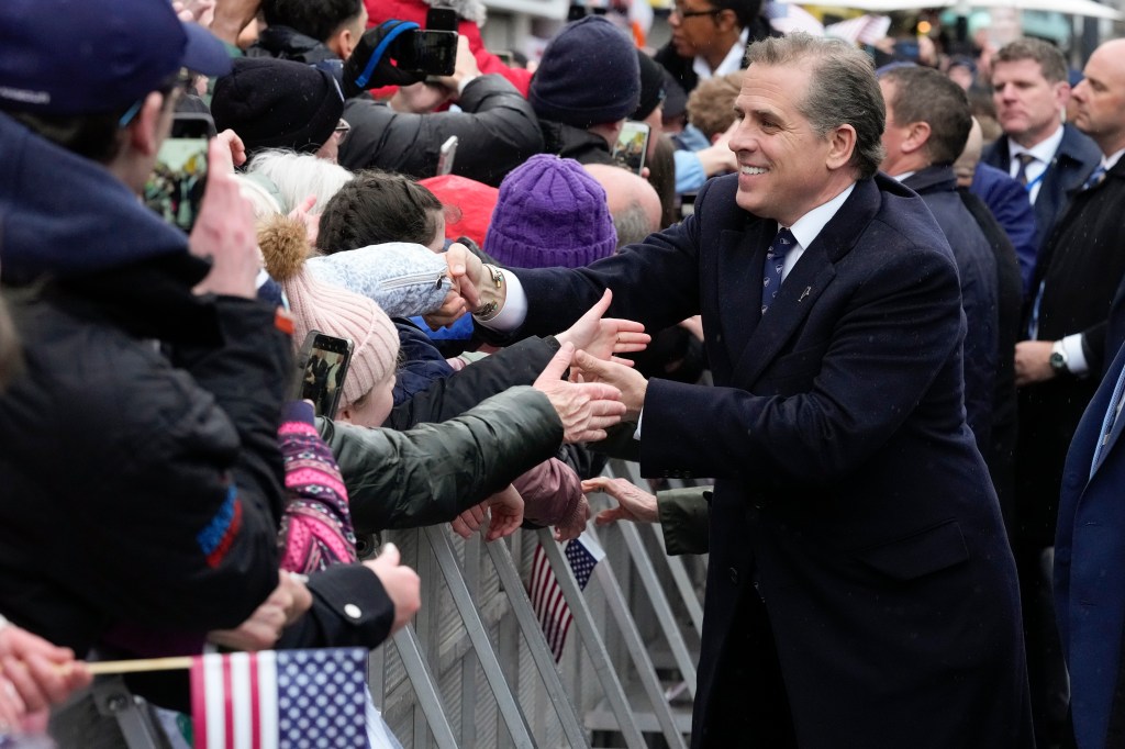 Hunter shaking hands with people in Dundalk during his father's state visit to Ireland on April 12, 2023.