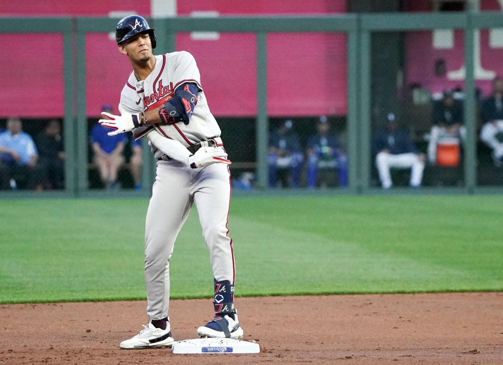 Atlanta Braves shortstop Vaughn Grissom (18) celebrates after hitting a double against the Kansas City Royals in the first inning at Kauffman Stadium.