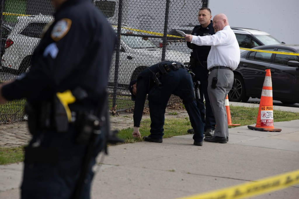 Investigators probe the shots fired scene at Flatlands Ave. and Louisiana Ave.