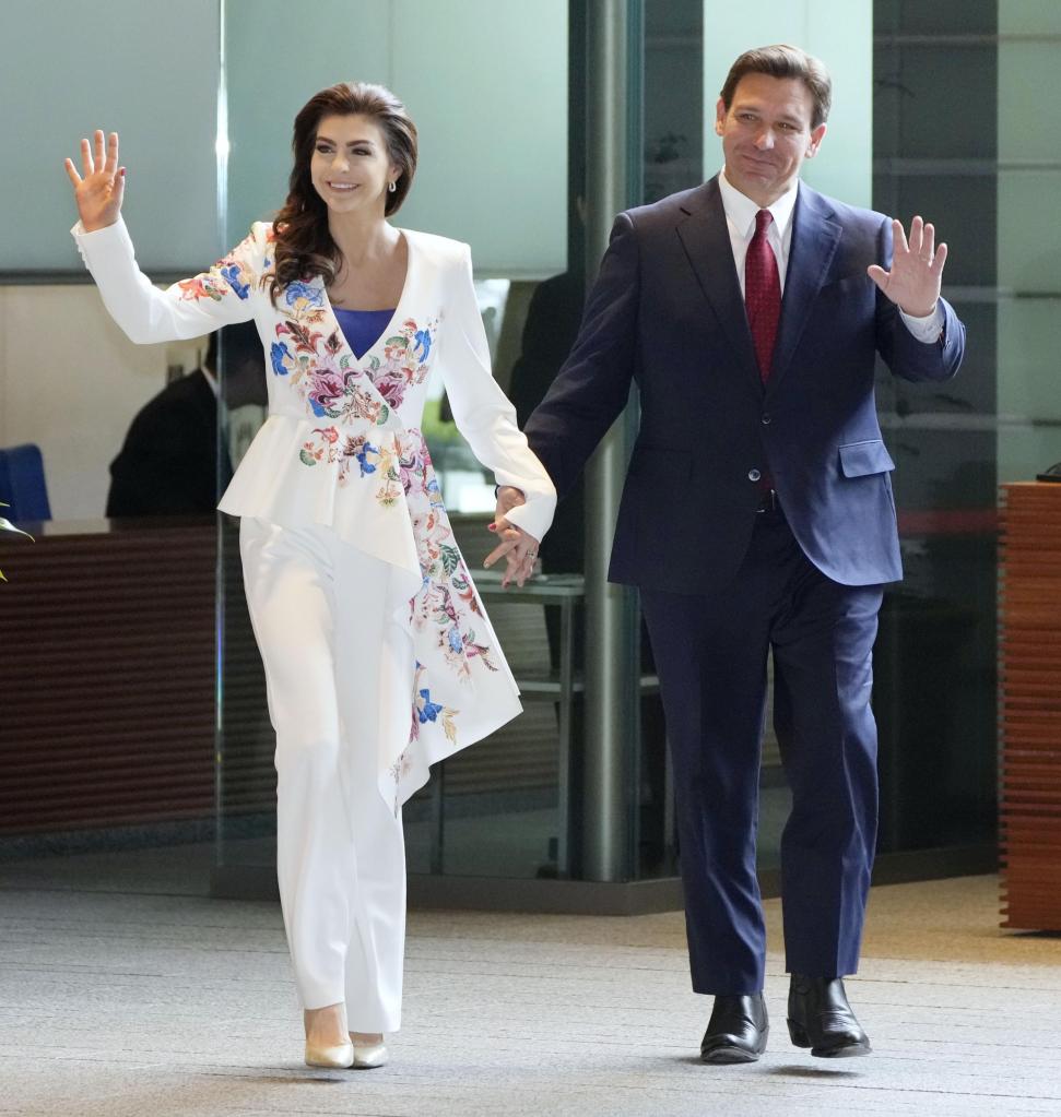 Florida's first lady stood out in a white peplum-enhanced suit featuring a bold floral print.