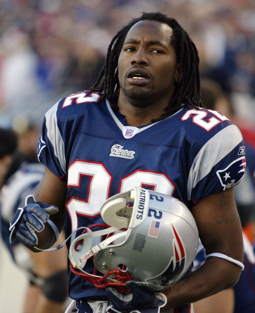 Qsante Samuel #22 of the New England Patriots stands on the sidelines