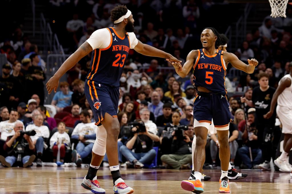 Mitchell Robinson and Immanuel Quickley celebrate during the Knicks' first-round playoff clincher.