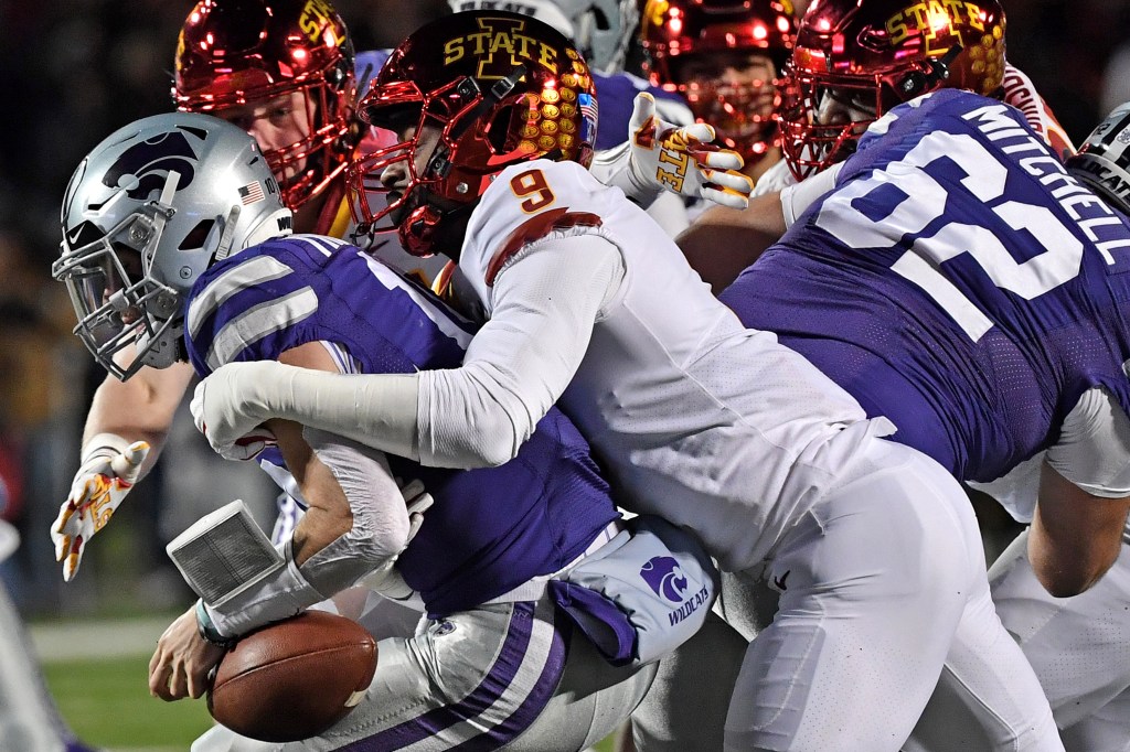 Linebacker Will McDonald #9 of the Iowa State Cyclones sacks quarterback Skylar Thompson #10 of the Kansas State Wildcats