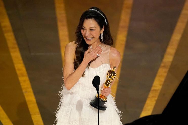 One month after winning the Best Actress Oscar for her role in "Everything Everywhere All At Once," Michell Yeoh has taken the statuette to her father's grave in Malaysia.