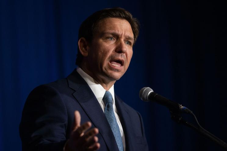 Florida Gov. Ron DeSantis, a likely 2024 Republican presidential candidate, speaks at a fundraising dinner Friday night in New Hampshire.