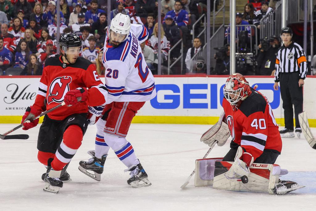 Akira Schmid makes a save during his shutout in the Devils' Game 5 win over the Rangers.