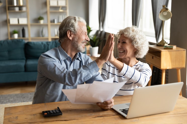 Overjoyed couple is approved for a $100,000 loan