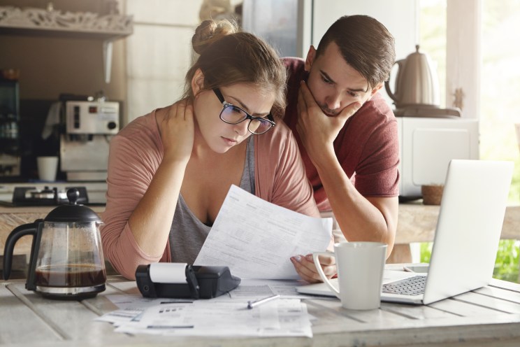 Couple reviews emergency loan options