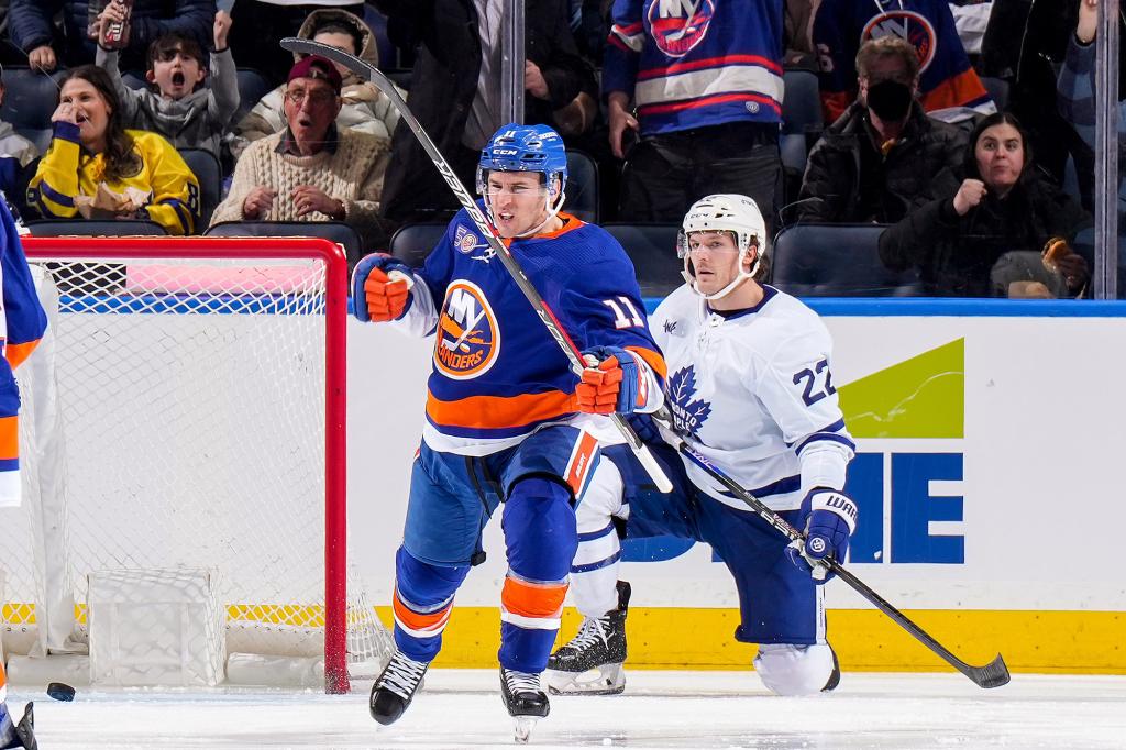 Zach Parise #11 of the New York Islanders celebrates after scoring a goal against the Maple Leafs.