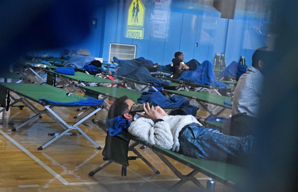 Approximately 75 single men migrating from other countries are being temporarily housed in the Sandra Feldman Gymnasium in Coney Island. 