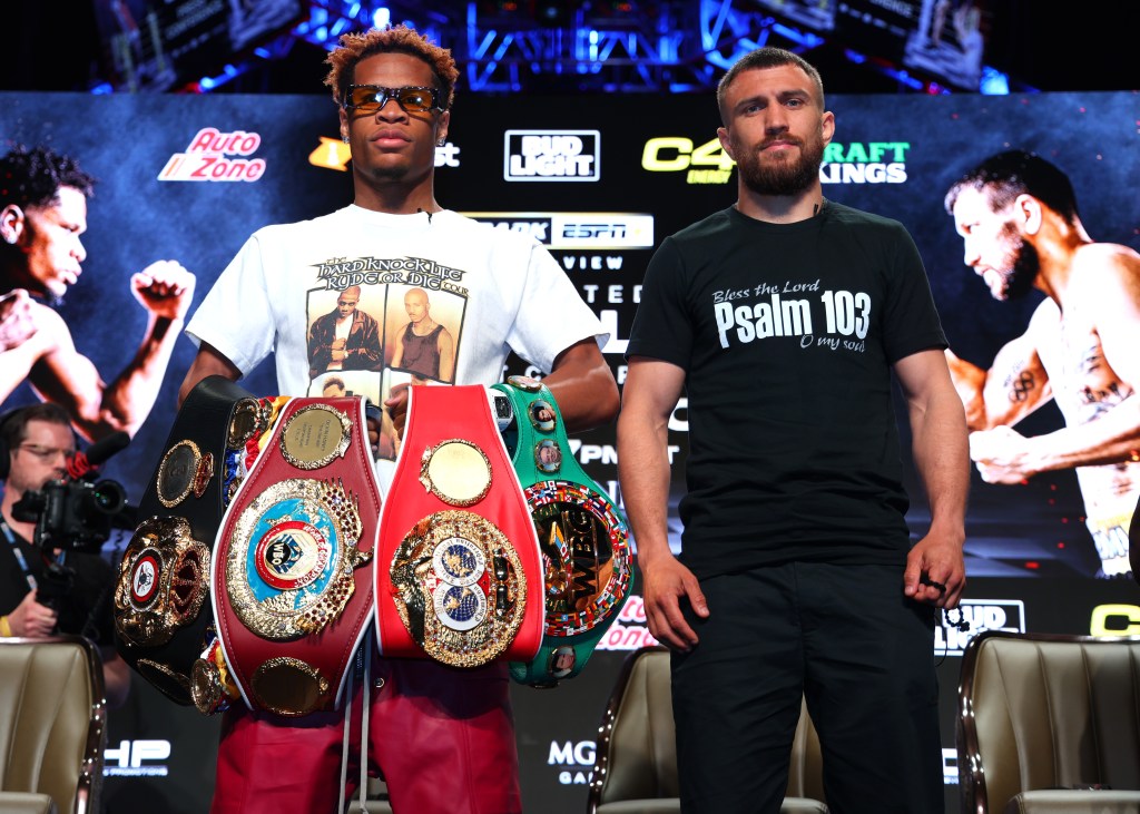 Vasiliy Lomachenko (r.) and Devan Haney square off ahead of their undisputed title fight. 