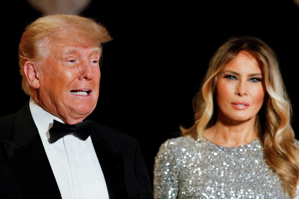 FILE PHOTO: Former U.S. President Donald Trump, who announced a third run for the presidency in 2024, and his wife Melania Trump, attend the New Year's Eve party at his Mar-a-Lago resort in Palm Beach, Florida, U.S. December 31, 2022. REUTERS/Marco Bello/File Photo FILE PHOTO: Trump hosts New Year's Eve party at his Mar-a-Lago resort, in Palm Beach, Florida