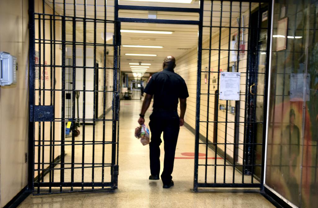 Generic picture of a DOC officer walking inside one of the cell blocks. 