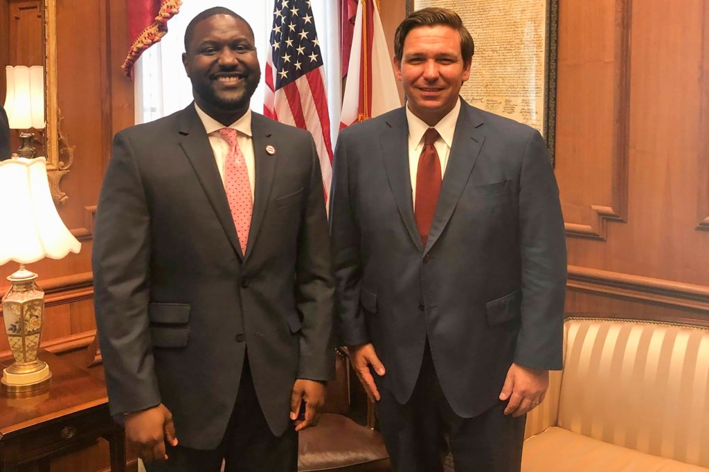 DeSantis ally Glenn Gilzean (pictured with DeSantis) has been appointed as an administrator on The Central Florida Tourism Oversight District board.