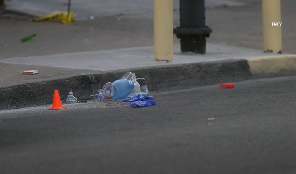 Police investigate the scene where Jerome Burleigh, 18, was shot and killed at E 172nd St and Commonwealth Ave. in the Bronx.