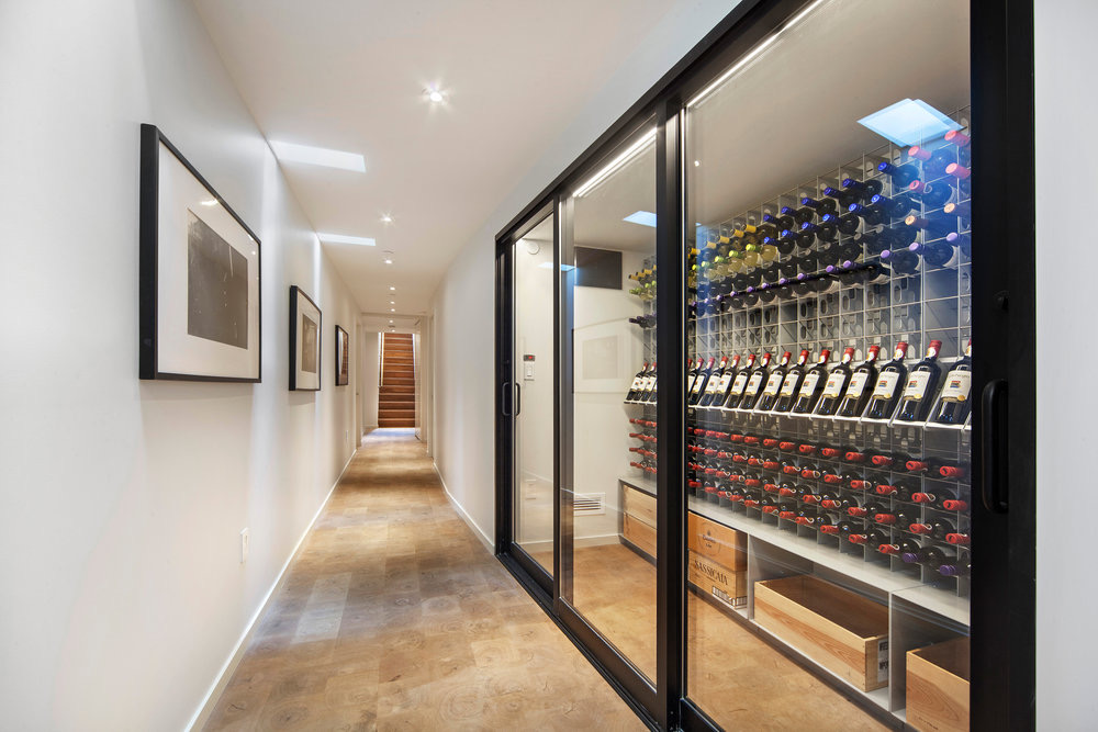 More than mere functionality, the tunnel also houses plenty of space for wine storage.