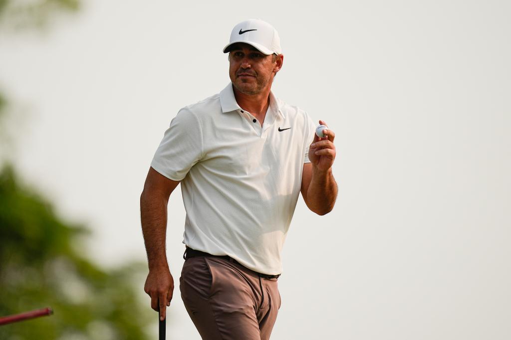 Brooks Koepka celebrates during the final round of the {GA Championship on May 21.