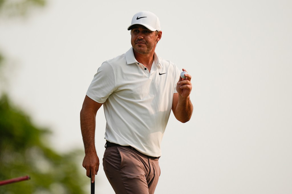 Brooks Koepka celebrates during the final round of the {GA Championship on May 21.