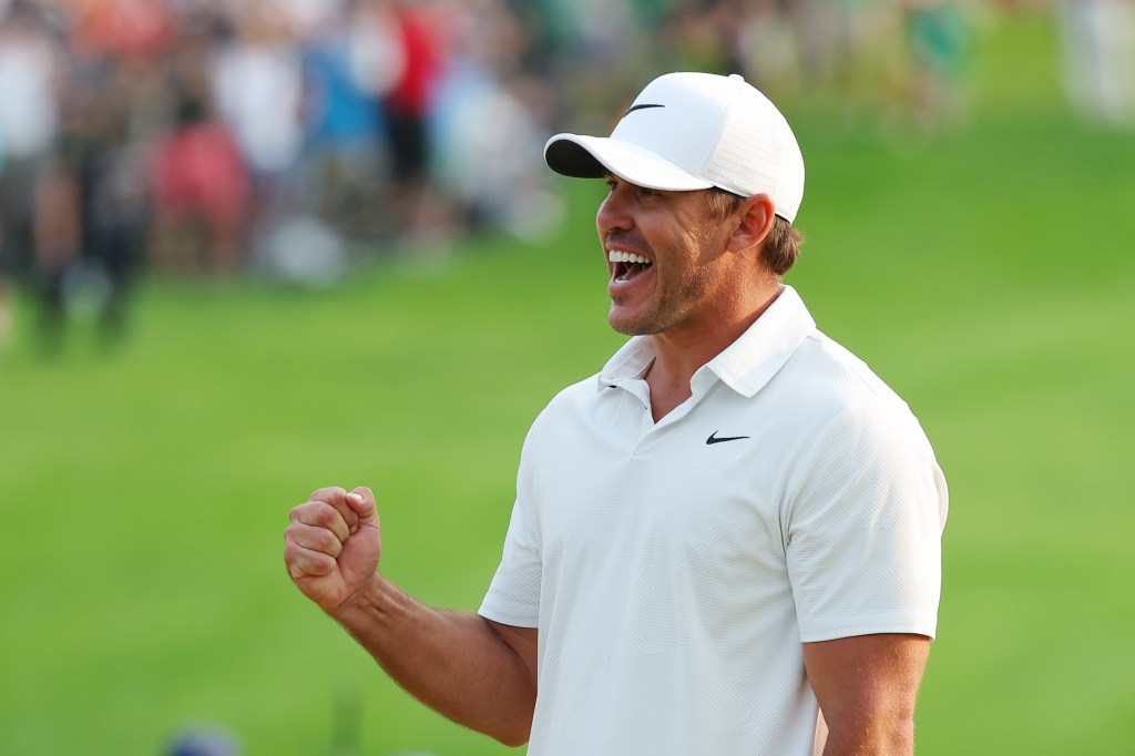 Brooks Koepka celebrates after winning the 2023 PGA Championship. 