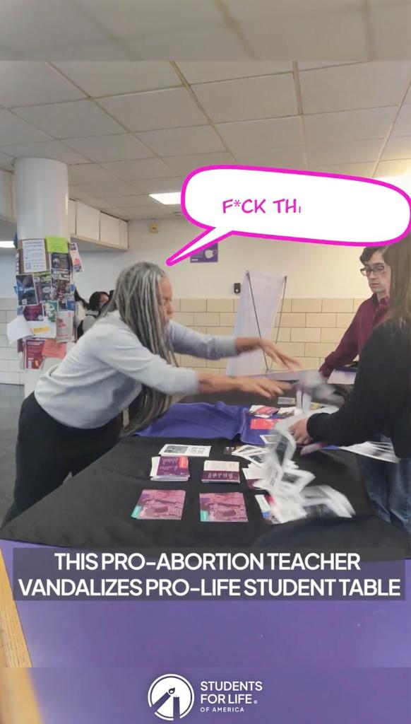 Shellyne Rodriguez throwing anti-abortion students' pamphlets off the table