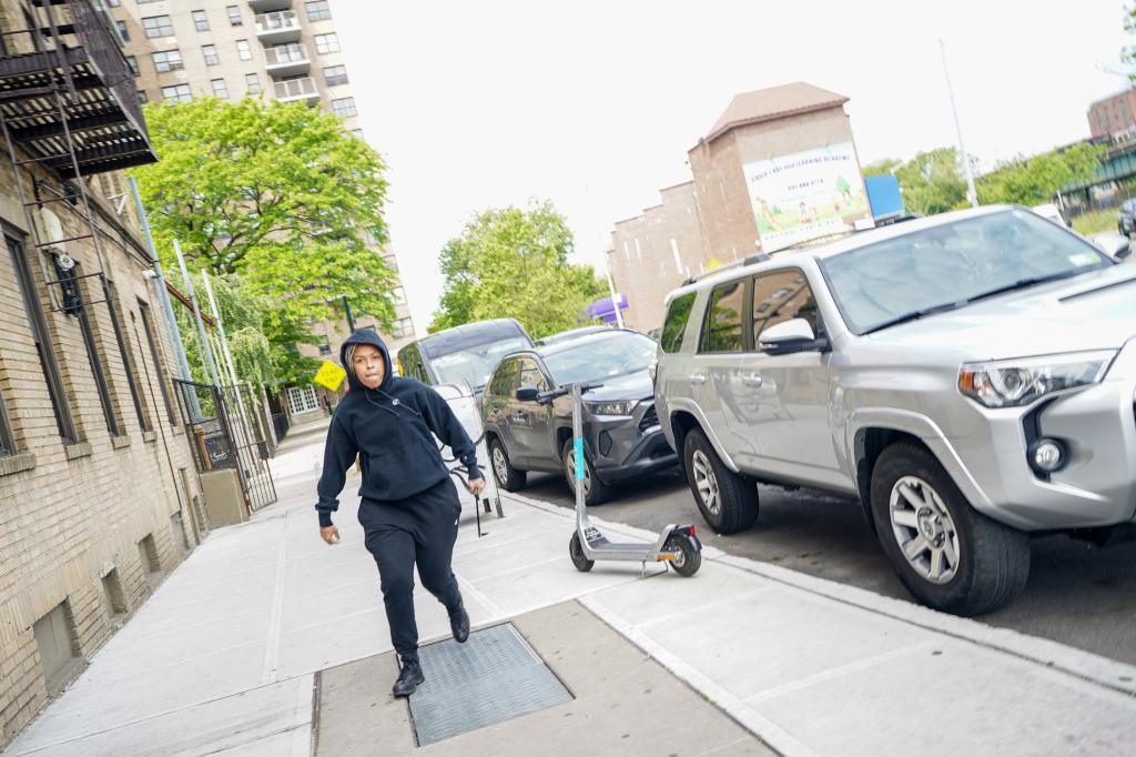 Moments after The Post left the building, the professor followed and chased the photographer down the street wielding the machete. 