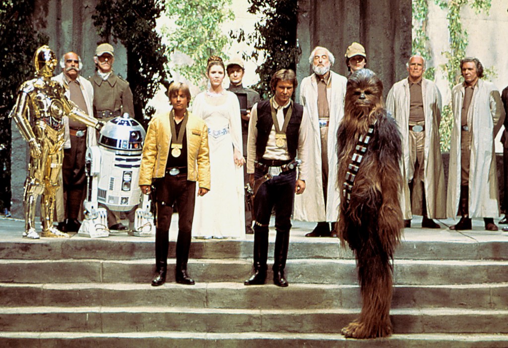 One of the final scenes of "Star Wars," with Princess Leia, Luke Skywalker, Han Solo, C-3PO, R2-D2, Chewbacca and other characters