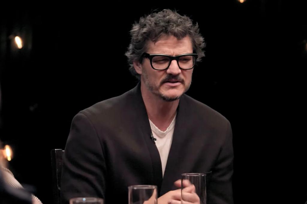 Pedro Pascal talking in glasses. 