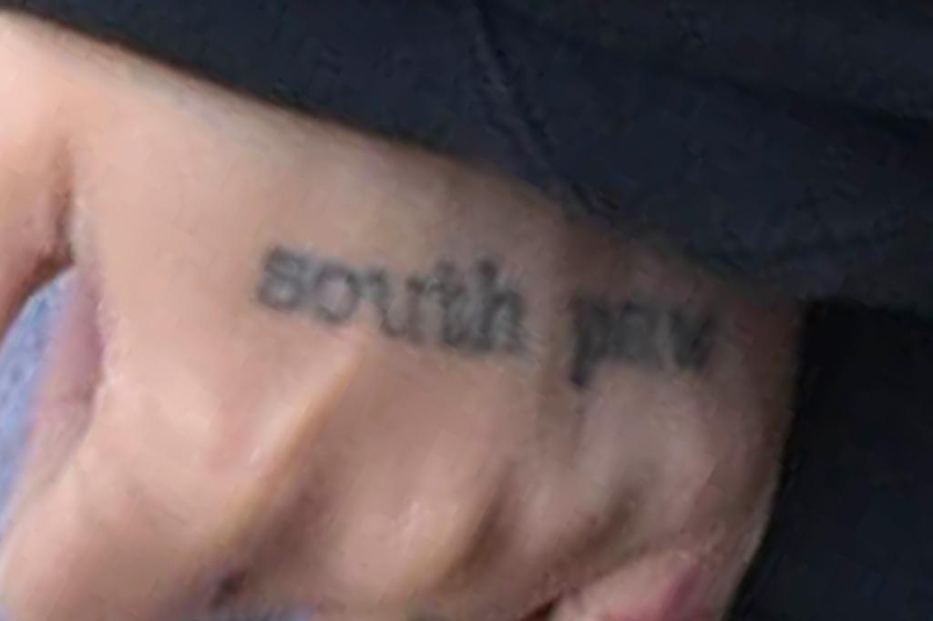 "South paw" tattoo