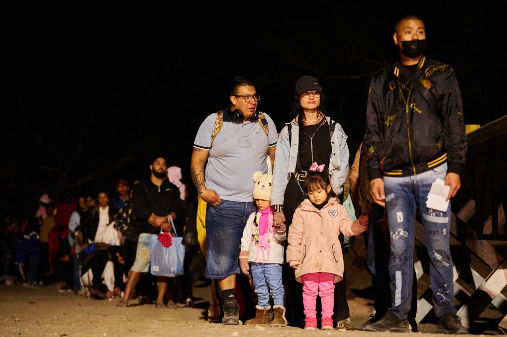 Migrants surrendering to Customs and Border Protection officers after crossing the border in Yuma, Arizona on May 28, 2023.