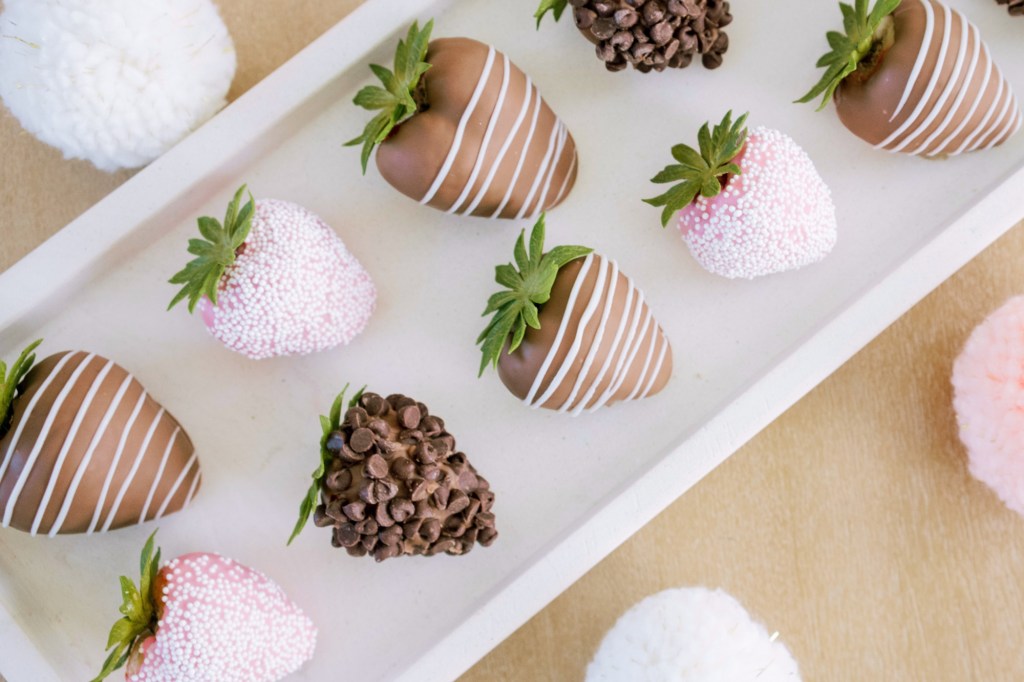 white plate with chocolate covered strawberries