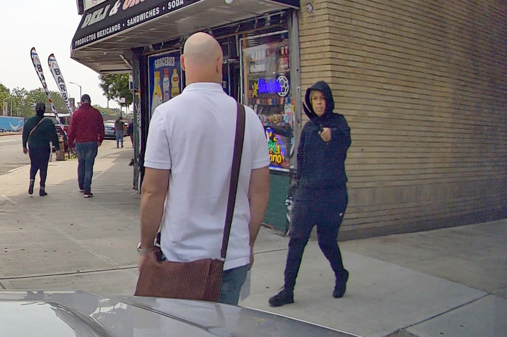 Shellyne Rodriguez can be seen chasing down the Post reporter with a machete 