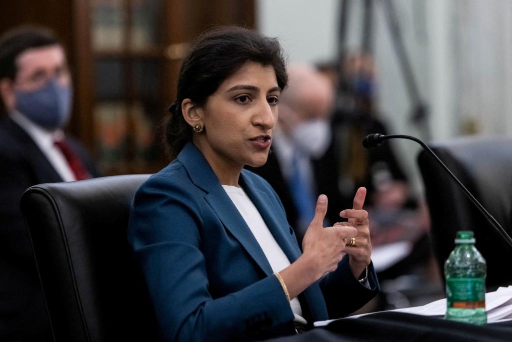 The Federal Trade Commission, which is headed by Lina Khan (above), is preparing a mammoth antitrust lawsuit against Amazon, according to Bloomberg News.