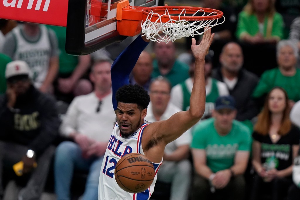 Harris (12) sinks the ball during the first half of Game 7 against the Boston Celtics. 