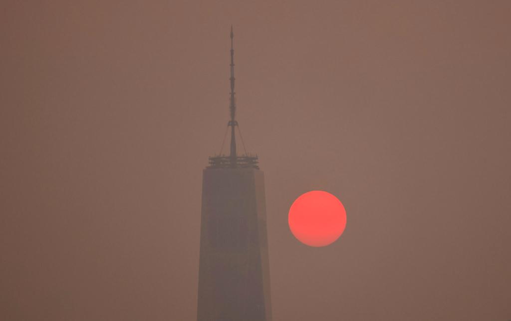 Smoke continues to shroud the sun.