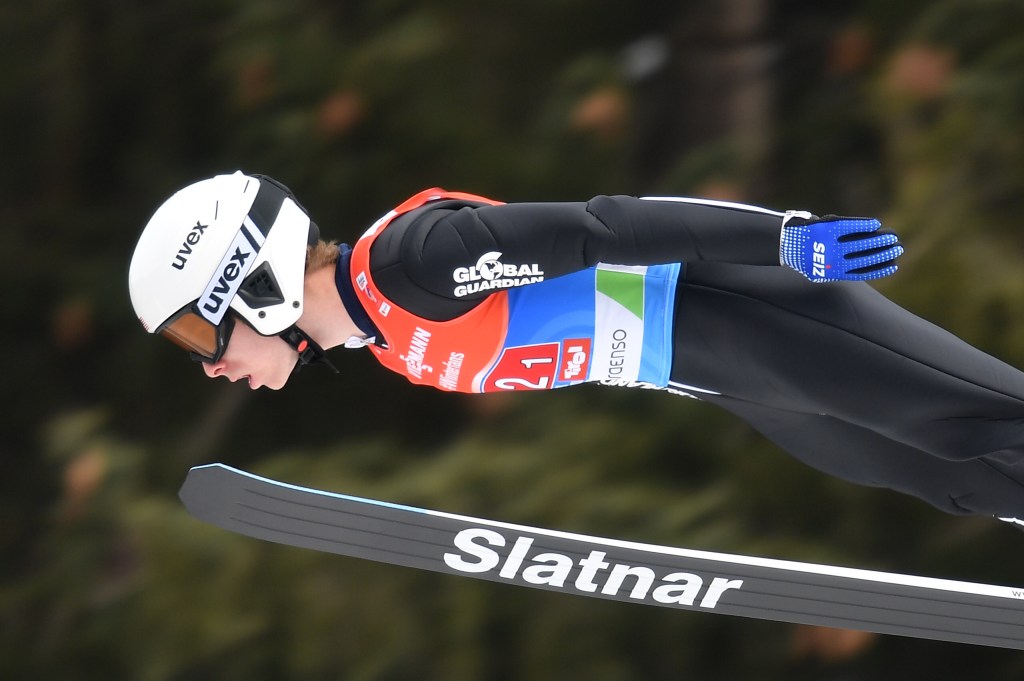 Patrick Gasienica of the US soars through the air during the men's HS130 ski jumping team event at the FIS Nordic World Ski Championships