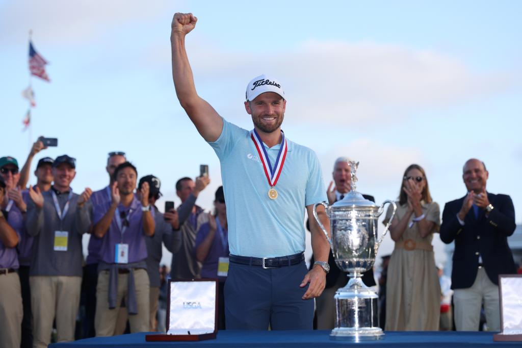 Wyndham Clark poses with the trophy after winning during the final round of the 123rd U.S. Open Championship at The Los Angeles Country Club.