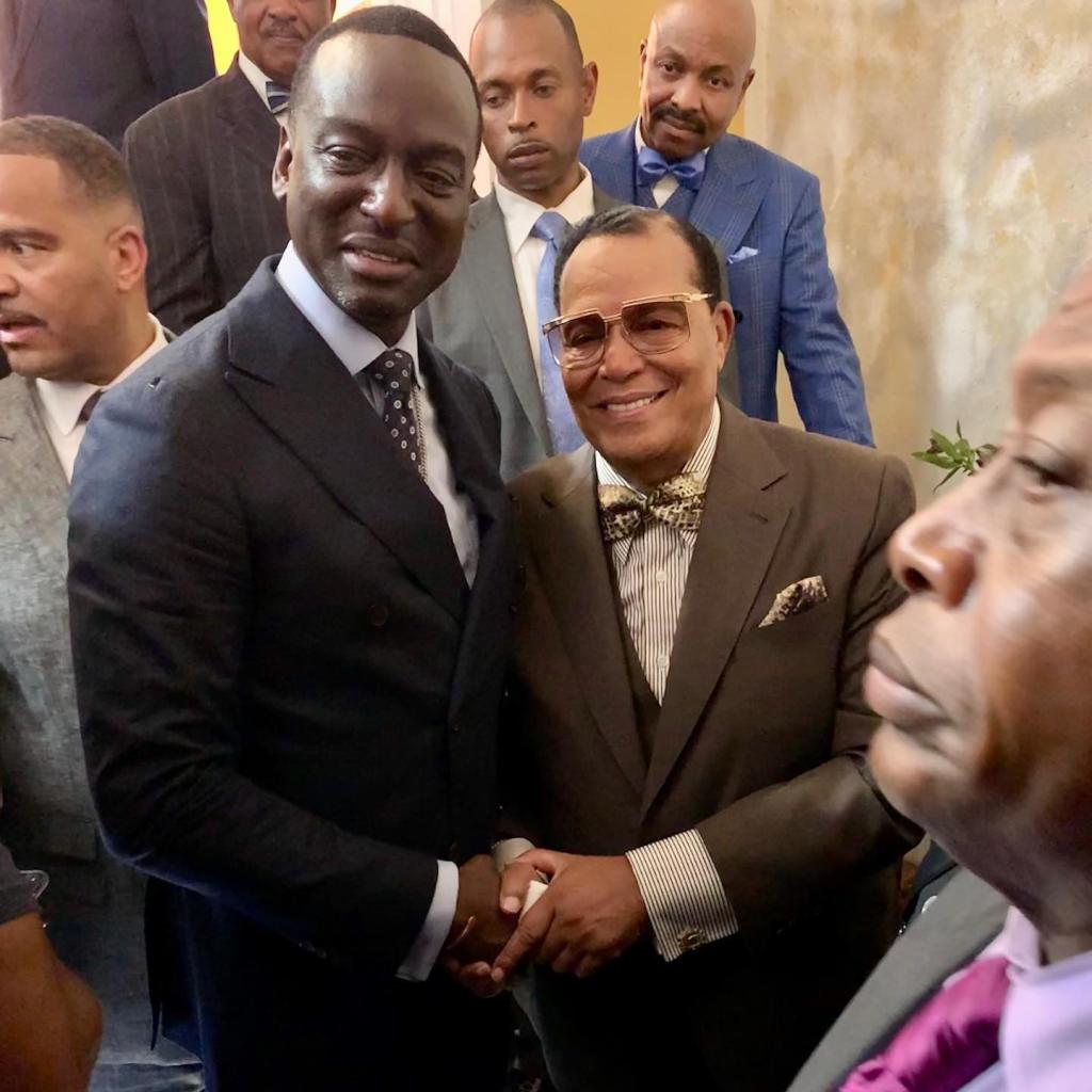 Yusef Salaam poses for a photo with American black supremacist and Nation of Islam leader, Louis Farrakhan.