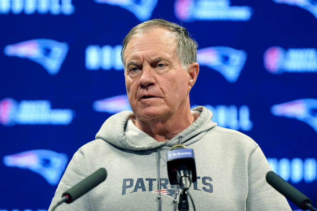 New England Patriots head coach Bill Belichick faces reporters during a news conference.