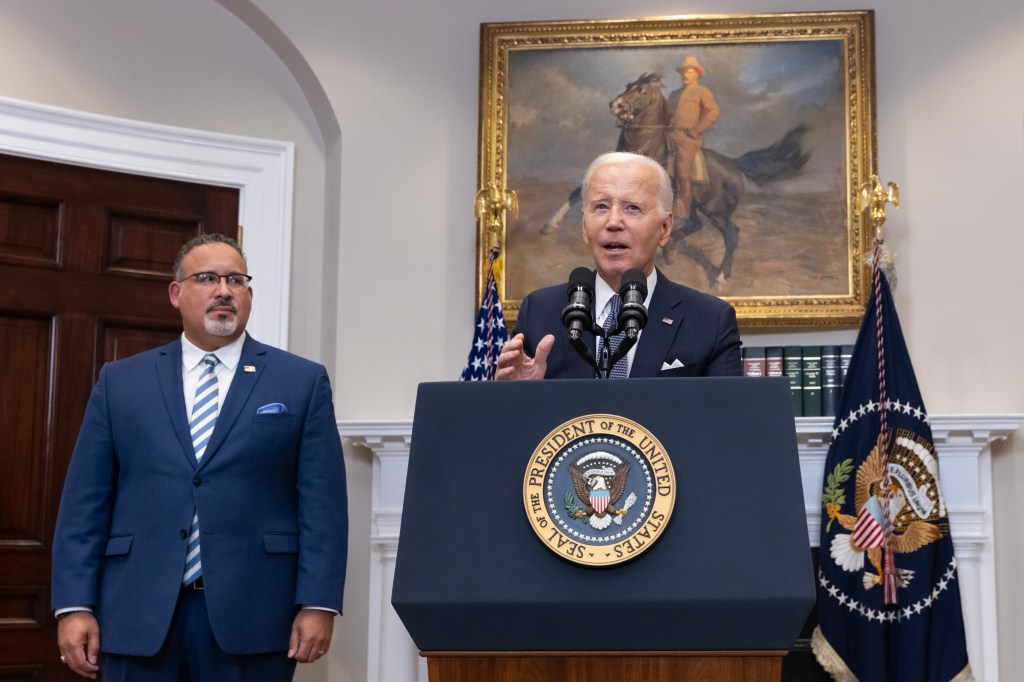 Education Secretary Miguel Cardona and President Biden